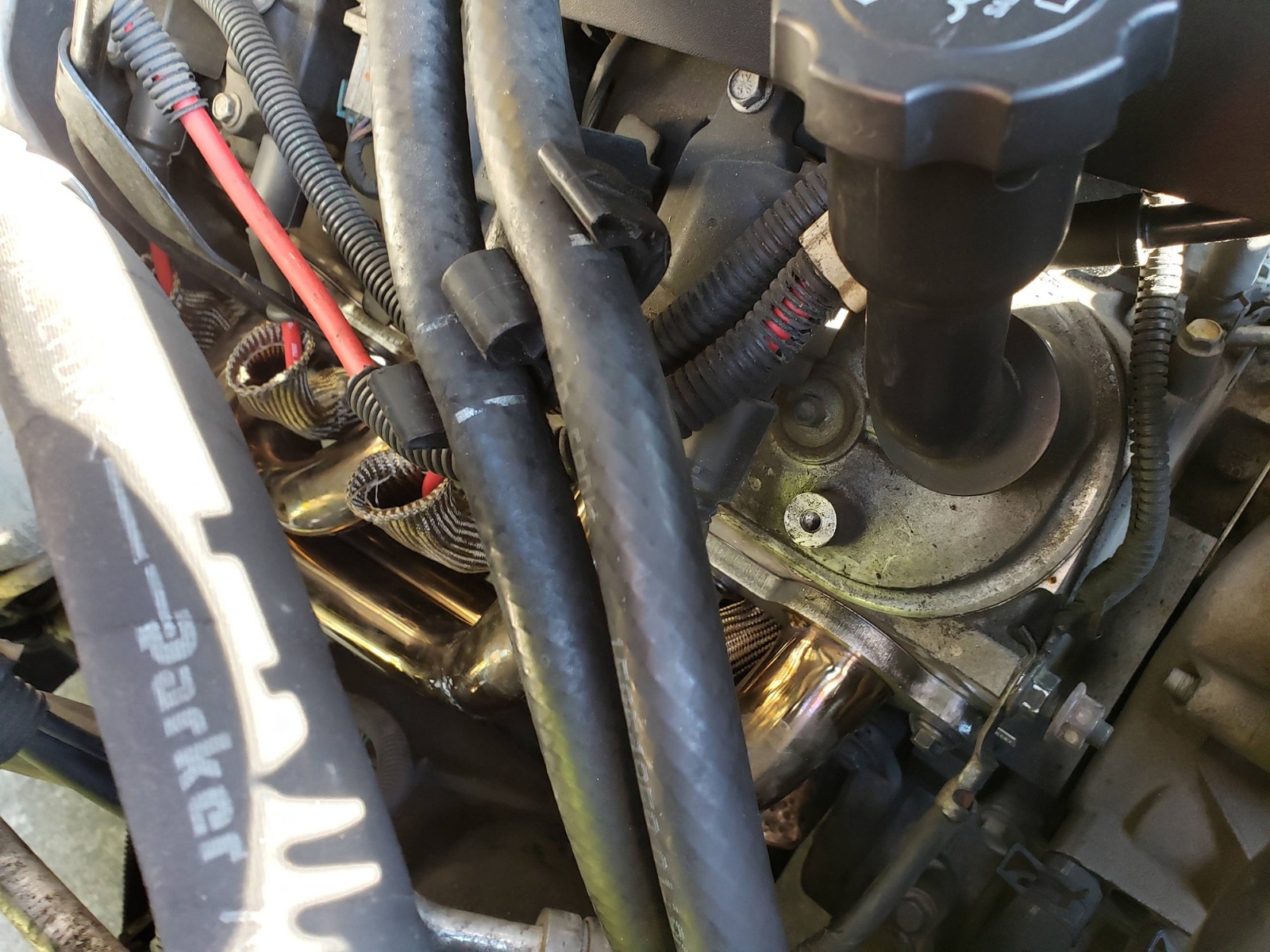 2007_escalade_shorty_headers_passenger_side.jpg