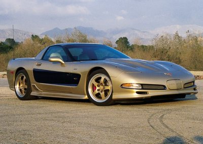 2003_chevrolet_corvette_z06-gold_passenger_side_front_view.jpg