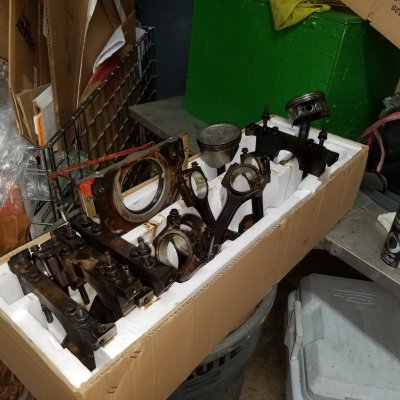 engine parts-pistons in box.jpg